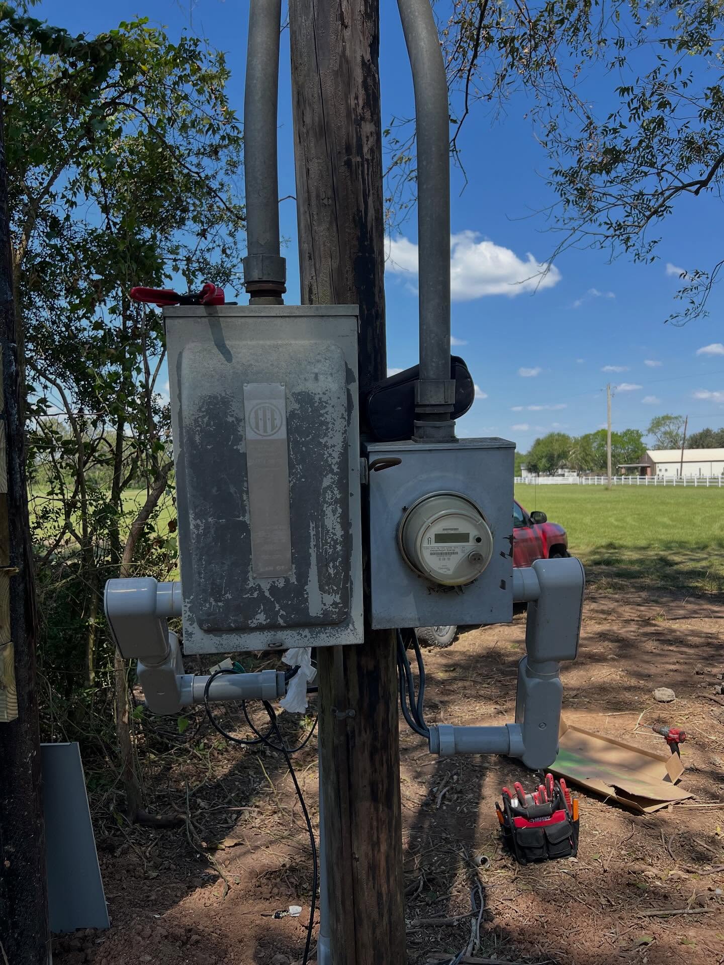 Completed rural overhead electrical service and meter upgrade on a Brazoria County ranch